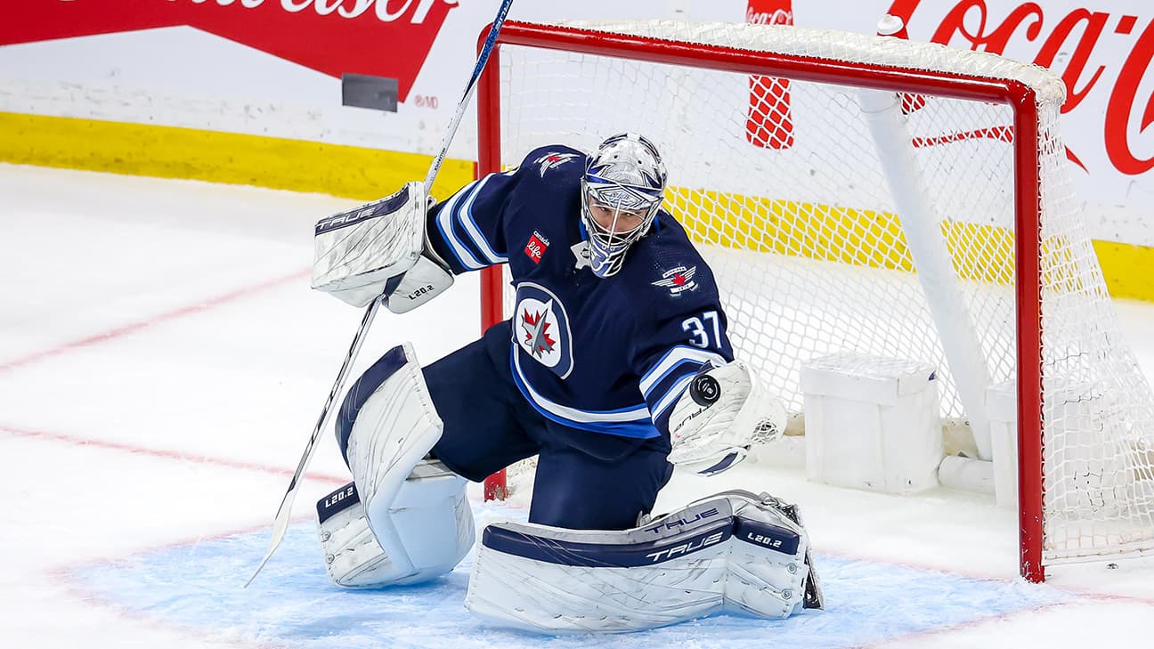 Connor Hellebuyck in action