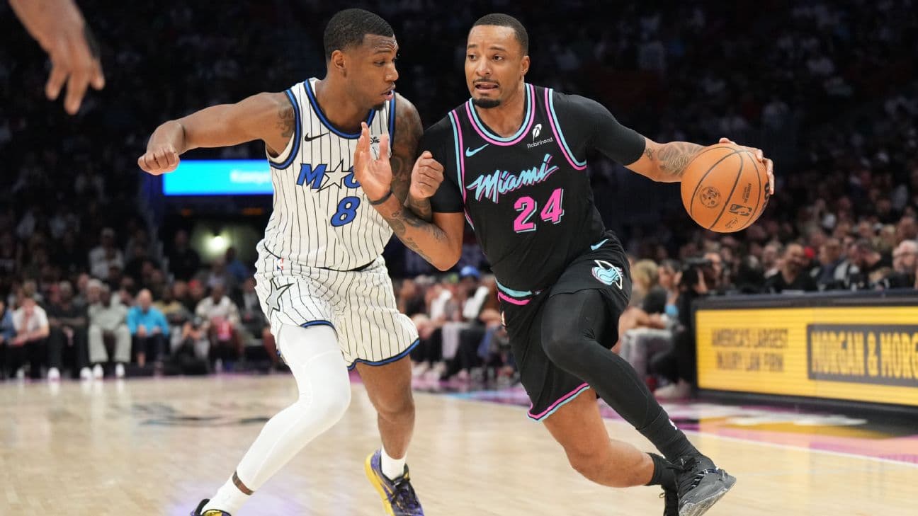 Miami Heat guard Norman Powell (24) drives to the basket as Orlando Magic forward Jamal Cain (8) defends during the second half at Kaseya Center.