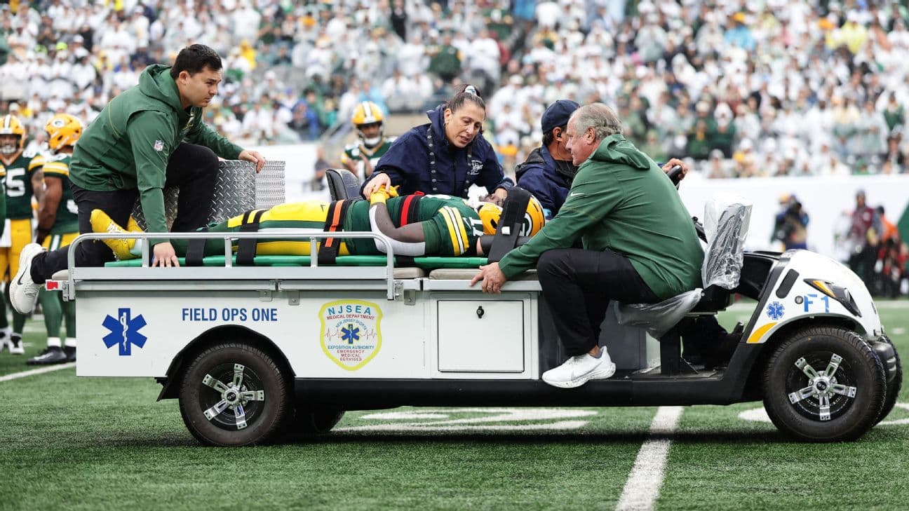 Packers wide receiver Jayden Reed was placed on a board and had his helmet strapped down for stabilization after the second play in Sunday's game against the Jets.