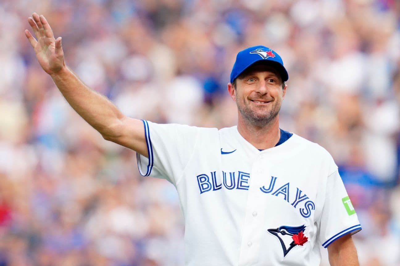 Blue Jays pitcher Max Scherzer reacts to fans after he was pulled from Sunday's game against the Reds in the eighth inning.