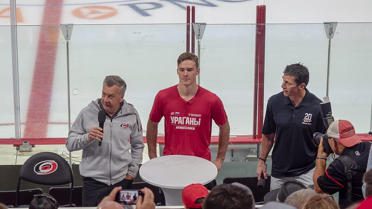 Don Waddell, Andrei Svechnikov, and Rod Brind'Amour